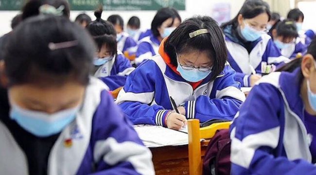 Çin'de  okullar eğitime kısmen başladı