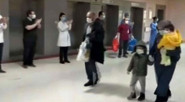 Çocuklarıyla taburcu olan aileler, alkışlarla uğurlandı