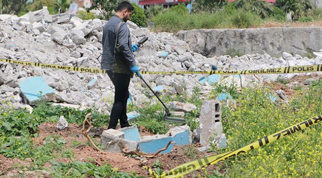 Polisi alarma geçiren mezardan köpek ölüsü çıktı