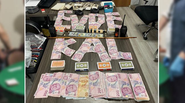 Ele geçirilen paralarla 'evde kal' mesajı