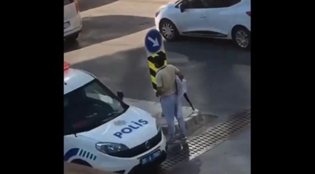Güpegündüz cadde ortasında pompalı tüfekle gezindi