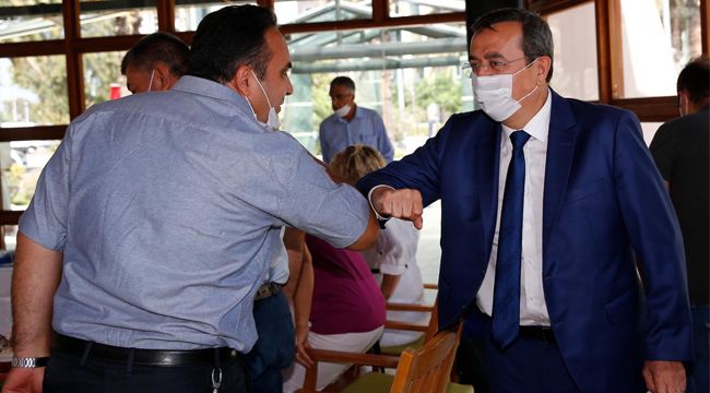 BAŞKANI  BATUR MUHTARLARLA BULUŞTU