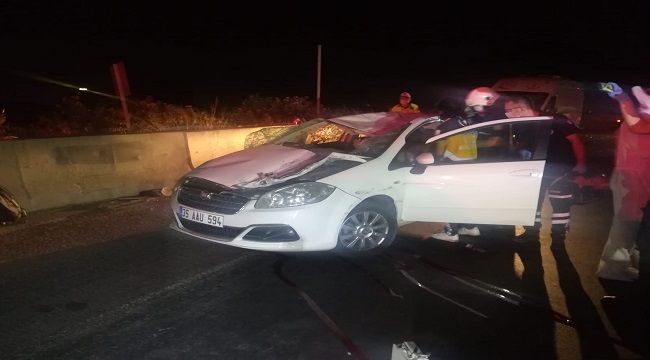 Takla atan otomobil beton bariyerlere çarparak durabildi