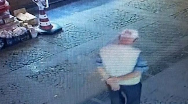 Yere atılan maskeyi alıp yüzüne taktı