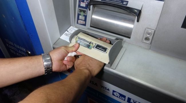 ATM'nin içinde gizli kameralı düzenek ele geçti