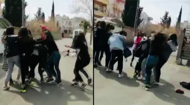 Genç kızların saç saça baş başa kavgası kamerada
