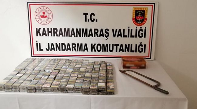Çaldıkları sigara paketlerini toprağın altında sakladılar