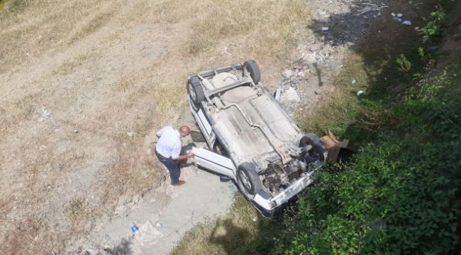 Dereye uçan otomobilden sağ çıktılar
