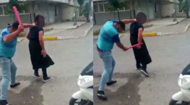 Eşini taciz eden kişiye iç çamaşırı giydirip dövdü