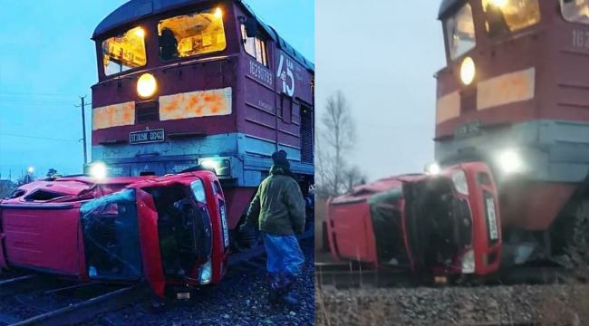 Rusya'da yük treni çarptığı aracı metrelerce sürükledi