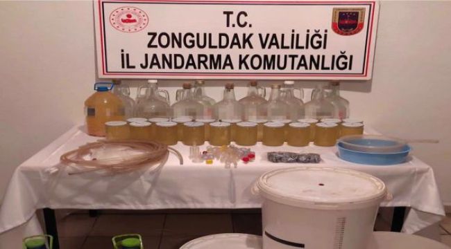 Evinde sahte alkol imal eden şahıslar yakalandı