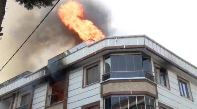 Alev alev yanan binadaki 5 kişi dumandan etkilendi