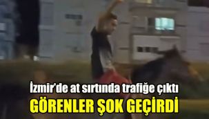İzmir’de at sırtında trafiğe çıktı: Görenler şok geçirdi