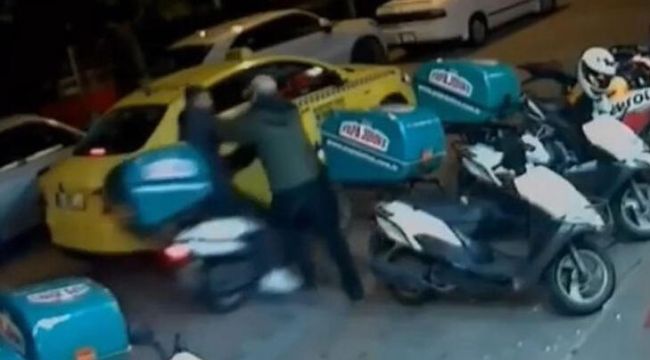 Taksiyle gelip motosiklet çalan hırsızı komşu esnaf yakaladı