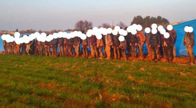 Kilis'te, arazide brandanın altına gizlenmiş halde 50 kaçak göçmen yakalandı