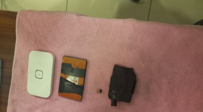 Ehliyet sınavında 'kopya' düzeneğiyle yakalandı