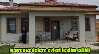 Depremzedelere evleri teslim edildi
