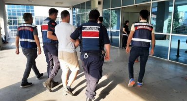 Göçmen kaçakçılarına İzmir merkezli operasyon: 17 gözaltı