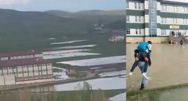 Okul bahçesi sular altında kaldı, öğrenciler birbirini sırtladı