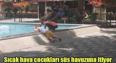 Sıcak hava çocukları süs havuzuna itiyor