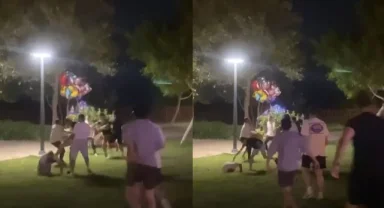 Yerdeki gencin yüzüne topa vurur gibi tekme attı