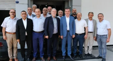 Hakan Koştu ve Bergama oda başkanlarından Yalçın Ata'ya ziyaret