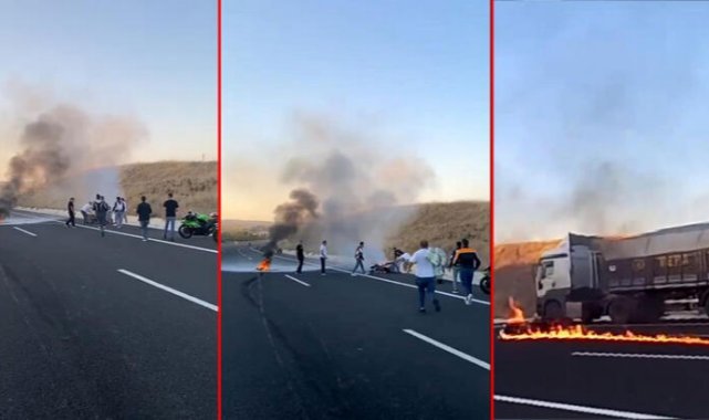 Devrilip, alev alan motosikletin sürücüsü yaralandı