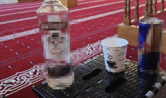 Camide içki şişeli fotoğrafa 7 ay 15 gün hapis