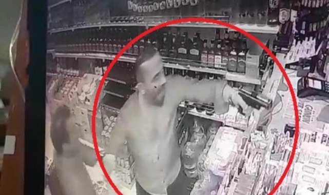 Gece yasak olduğu için alkol satmayan tekel bayi sahibini silahla tehdit etti