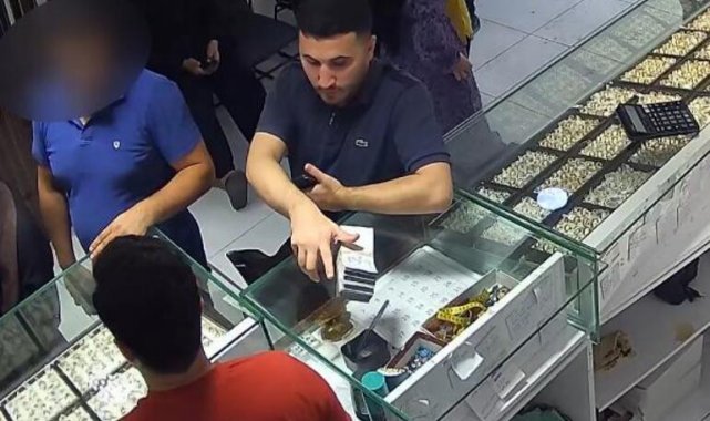 'Sazan sarmalı' ile yapılan vurgunda şebeke liderinin para ve altınları teslim aldığı anlar kamerada