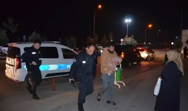 Eşini bıçaklayan şüphelinin gözaltına alınırken kucağındaki bebek, devlet korumasında