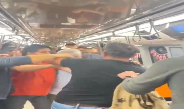 Metroda ‘tükürük’ kavgası kamerada: Metro boks ringini aratmadı