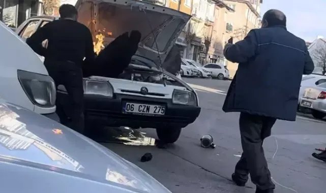 Otomobil alev aldı, sahibi montuyla söndürmeye çalıştı
