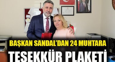 Başkan Sandal’dan 24 muhtara teşekkür plaketi