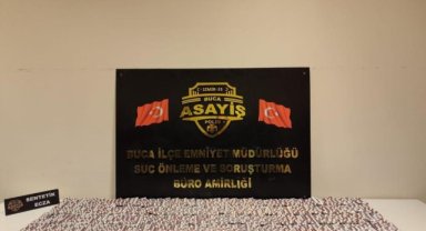 İzmir'de kıskıvrak yakalanan 2 zehir taciri tutuklandı