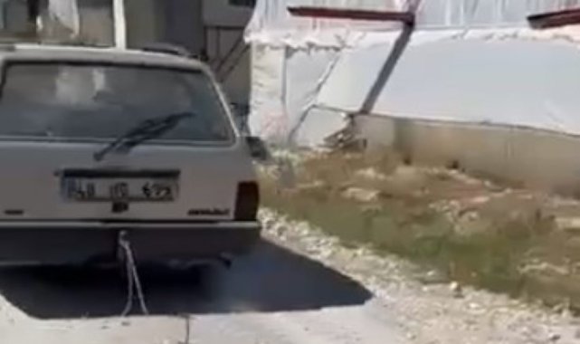 Köpeğine zarar veren adamı otomobile bağlayıp 150 metre sürükledi