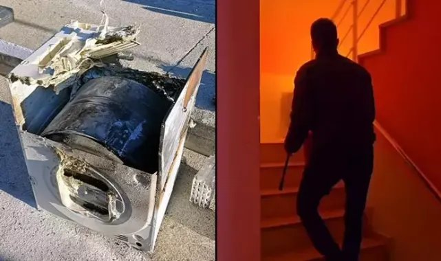 Alev alan çamaşır kurutma makinesini apartman boşluğuna attı