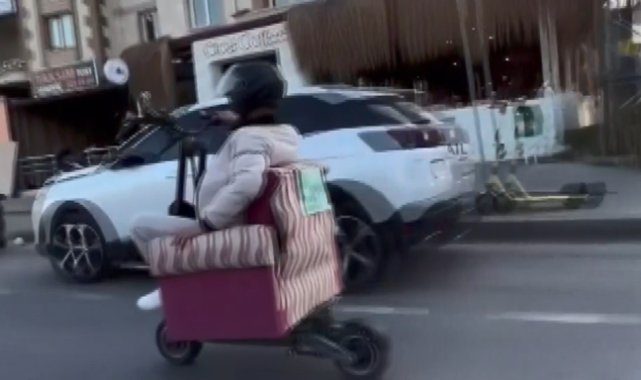 Scooter’a yerleştirdiği koltukla trafiğe çıktı