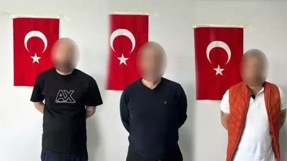 Gürcistan'da yakalanan 5'i kırmızı bültenle aranan 8 şüpheli Türkiye'ye getirildi