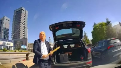Trafikte tartıştığı sürücünün üzerine beyzbol sopasıyla yürüdü