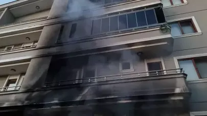 Binada çıkan yangnda 2'nci katın balkonundan düşüp yaralandı