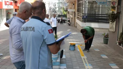 Konak’ta kaldırım işgaline sarı çizgi