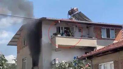 Yangında mahsur kalan kadını, itfaiye ekipleri kurtardı