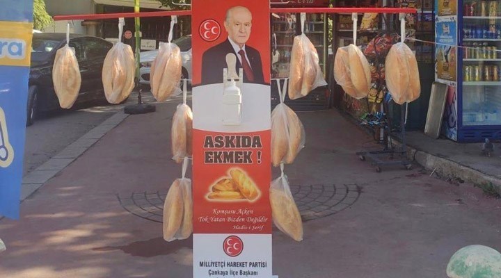 YÜCEL'DEN MHP'YE 'ASKIDA EKMEK' YANITI