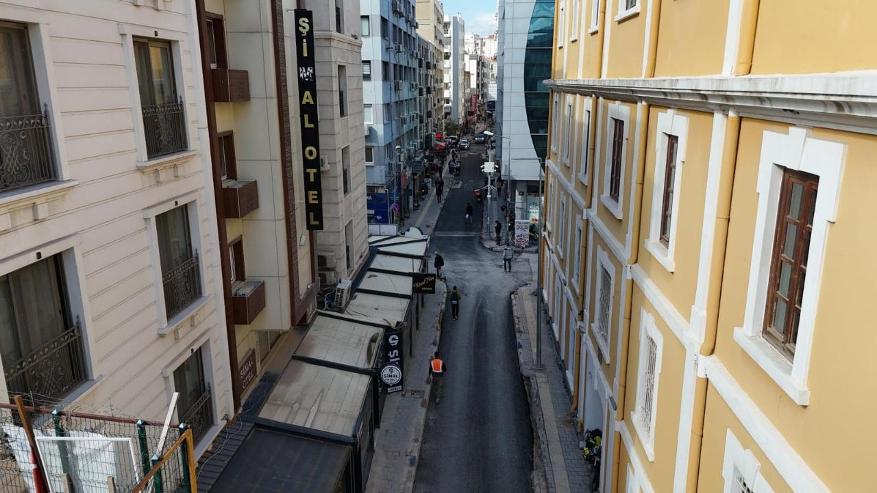 Alsancak’ta altyapısı tamamlanan sokaklar asfaltlanıyor