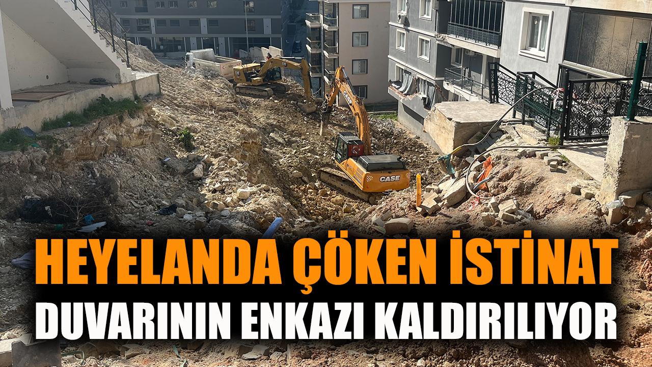 Heyelanda çöken istinat duvarının enkazı kaldırılıyor