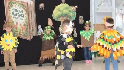 Ödemiş'te minik öğrencilere kitap kurdu madalyası