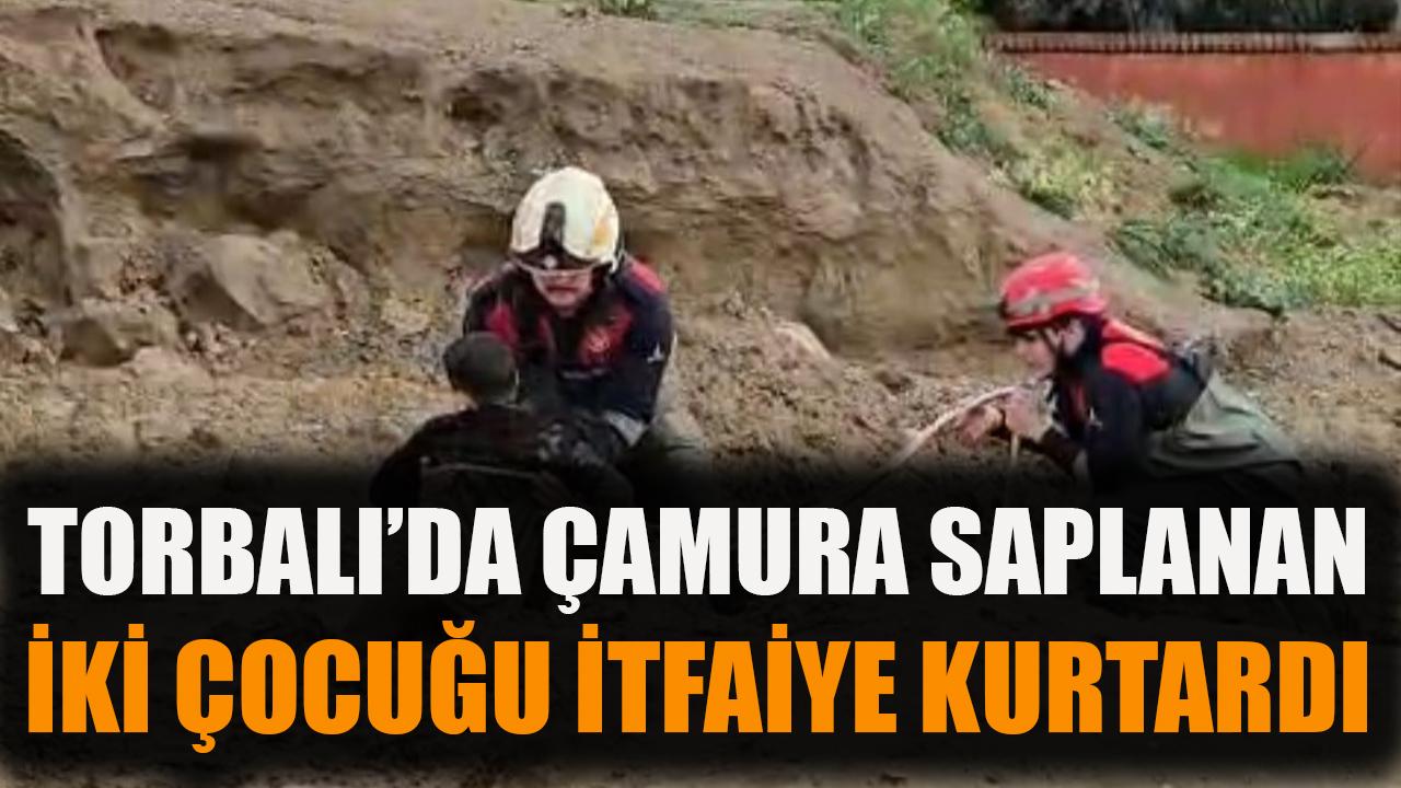 Torbalı'da çamura saplanan iki çocuğu itfaiye kurtardı